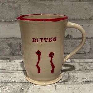 Bitten vampire teeth marks Cream 12 oz coffee Mug with Red blood Accents